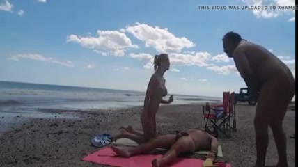 Nudist Girl At The Beach Teasing Naked Men To Masturbate On Her