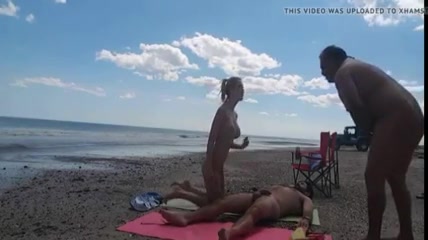 Guy Masterbating Infront Of Friend - Nudist girl at the beach teasing naked men to masturbate on her